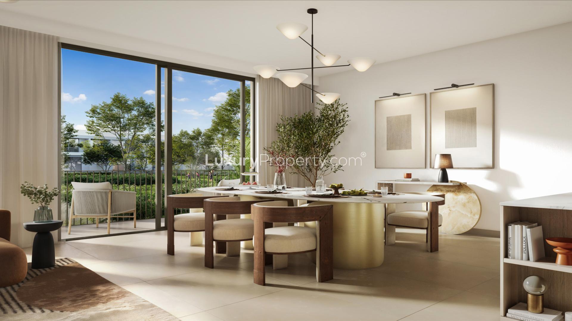 Stylish living room in 3-bedroom townhouse, Kaia, The Valley, with modern decor and garden view