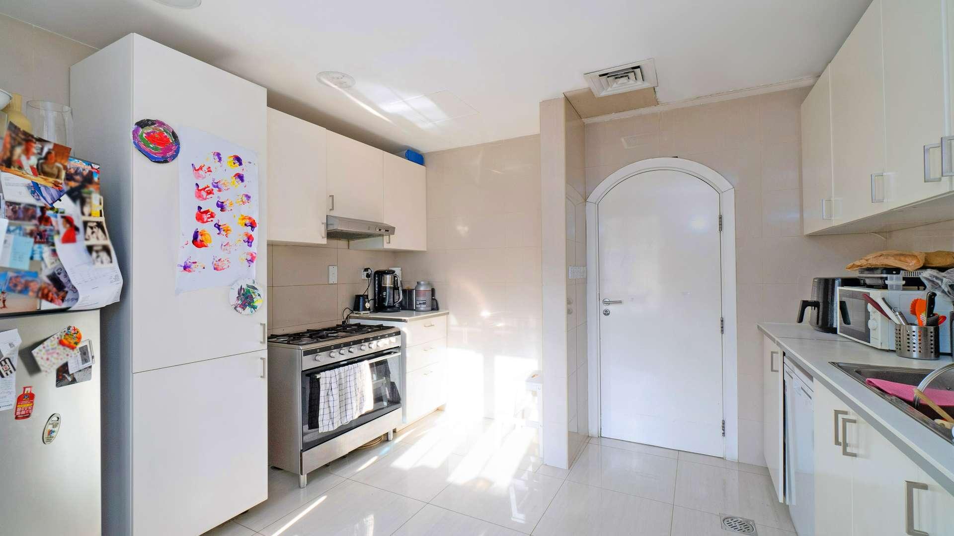 Bright kitchen in 3-bedroom villa for sale in The Springs, Dubai