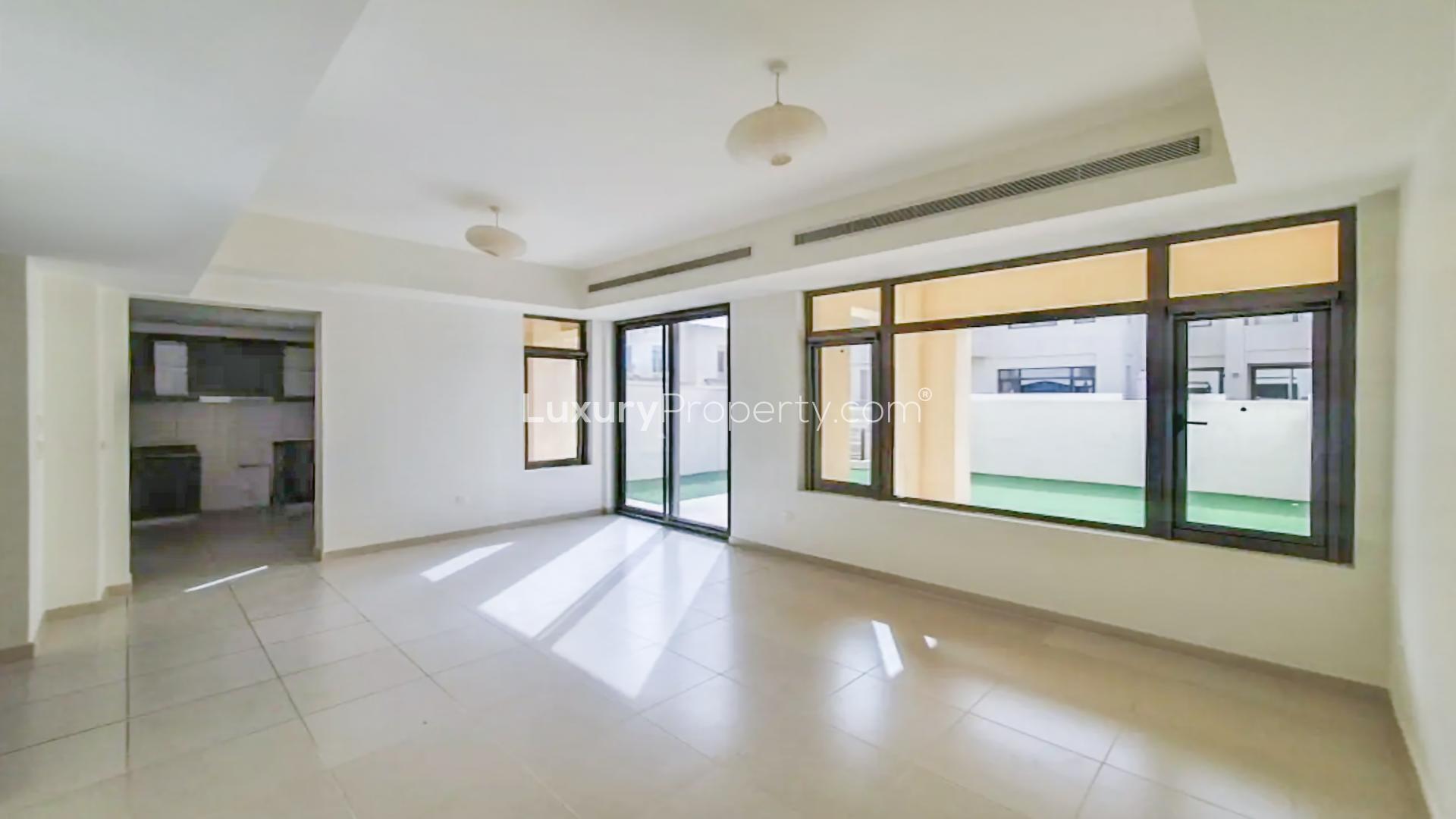 Luxurious 3-bedroom villa exterior with garden in Mira Oasis, Reem community