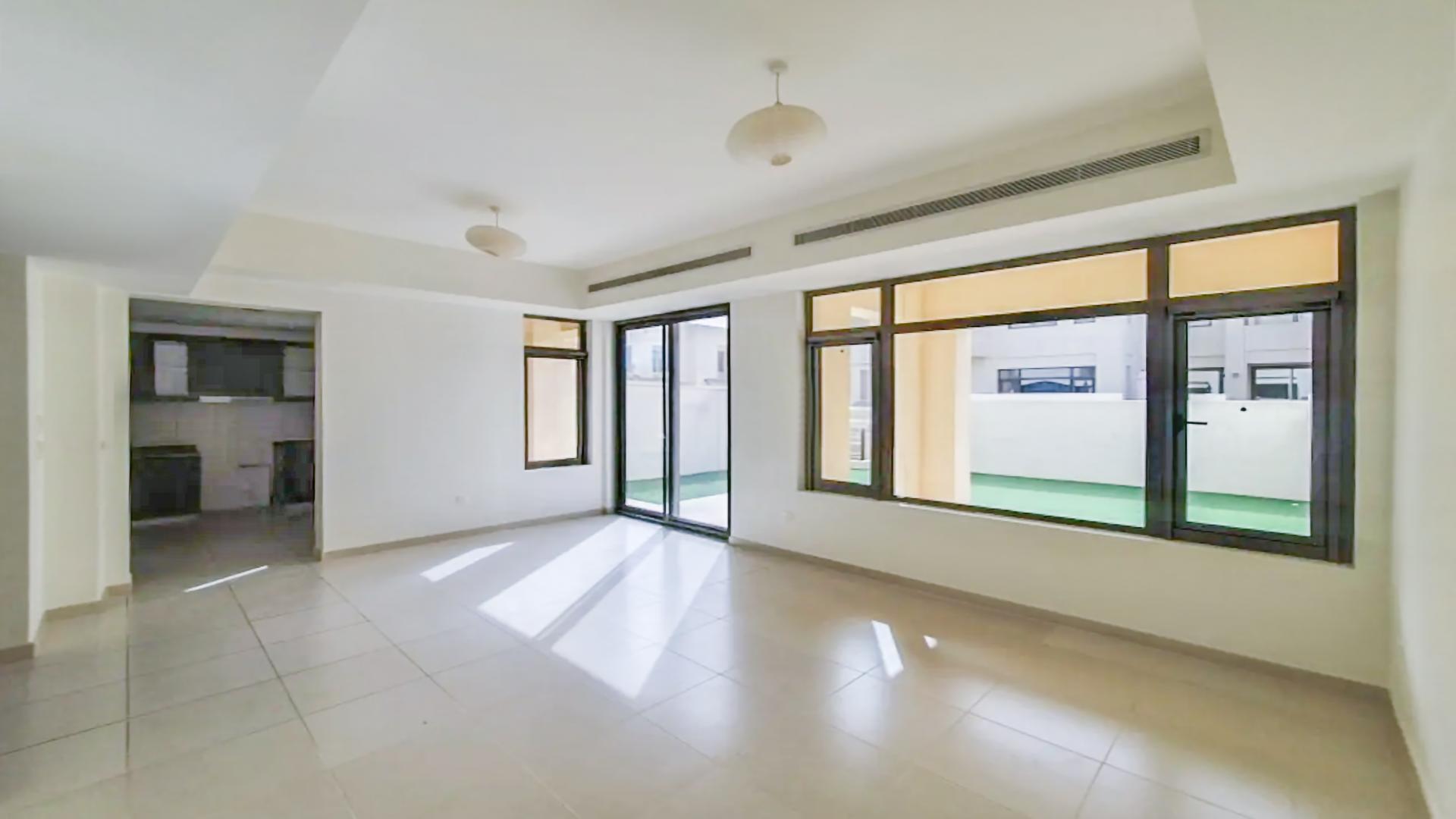 Luxurious 3-bedroom villa exterior with garden in Mira Oasis, Reem community