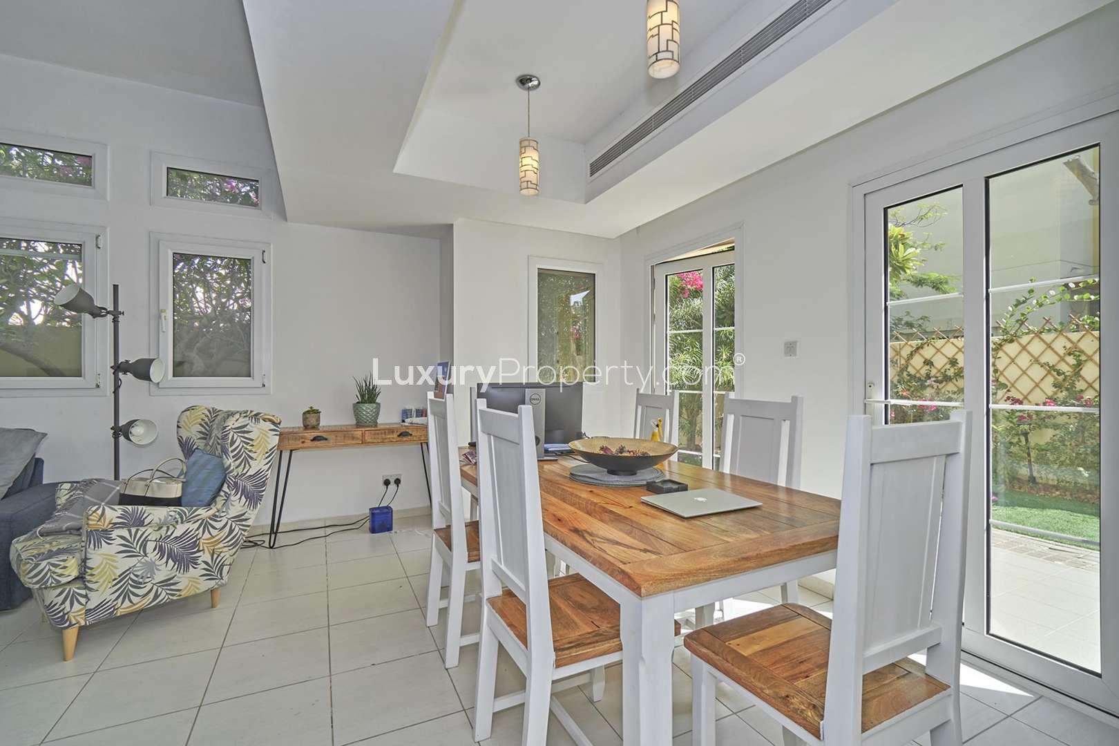 N/A,Charming villa patio with outdoor seating and landscaped garden in Zulal, The Lakes