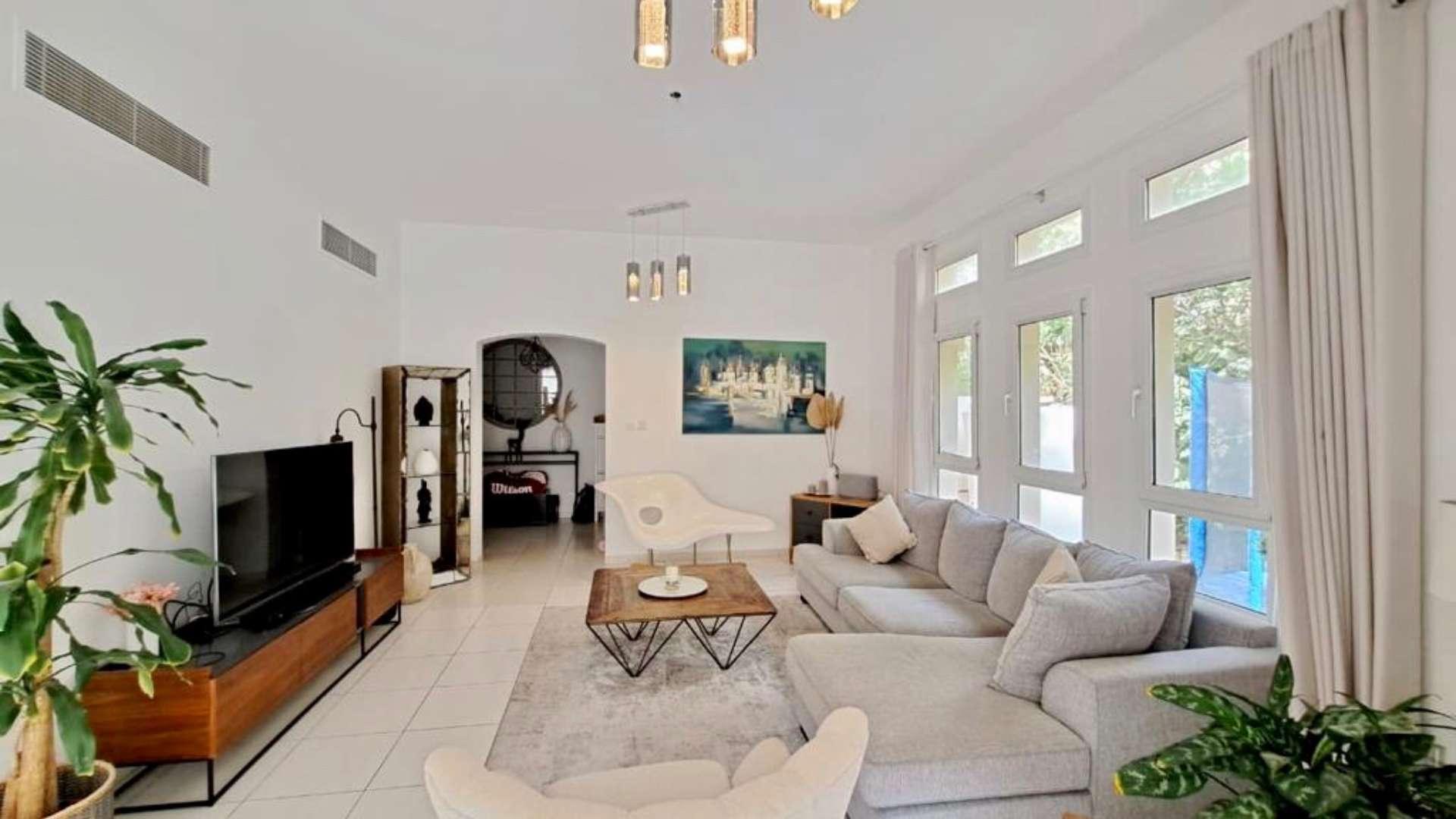 Charming villa garden with patio seating in Zulal, The Lakes, Dubai, for sale