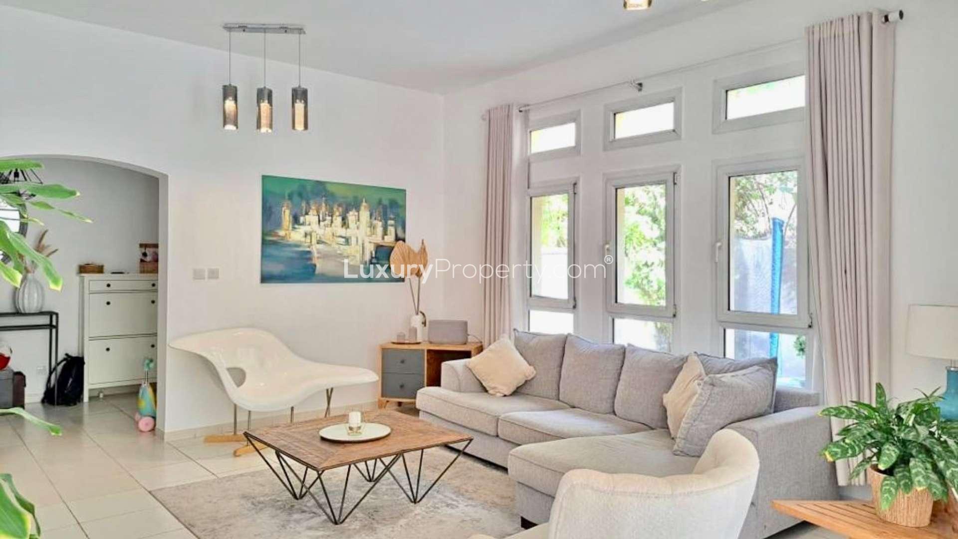 Charming living room in 3-bedroom villa, Zulal, The Lakes, featuring modern decor and ample light