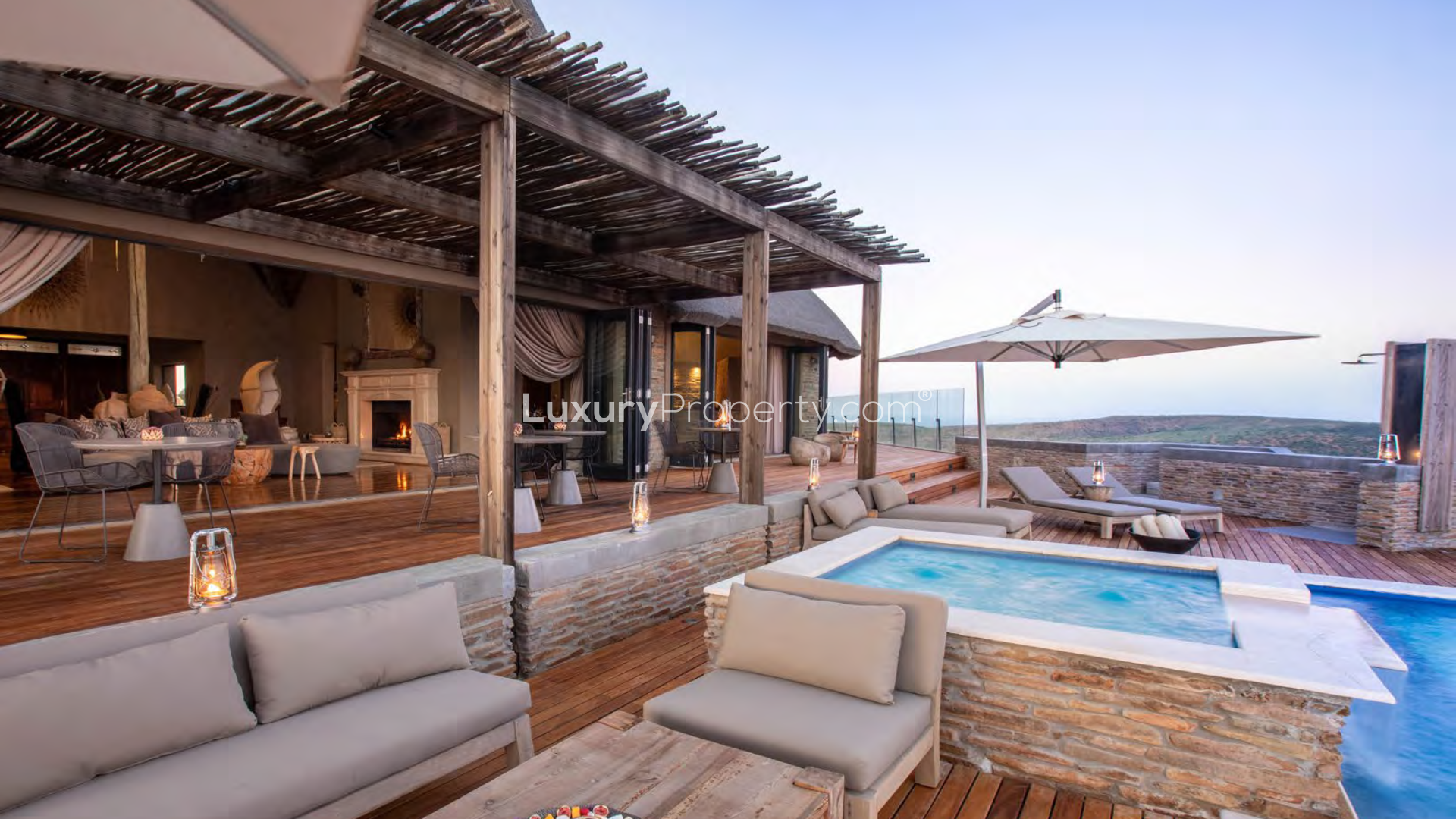 Luxurious villa interior with fireplace and panoramic views in Great Karoo, South Africa