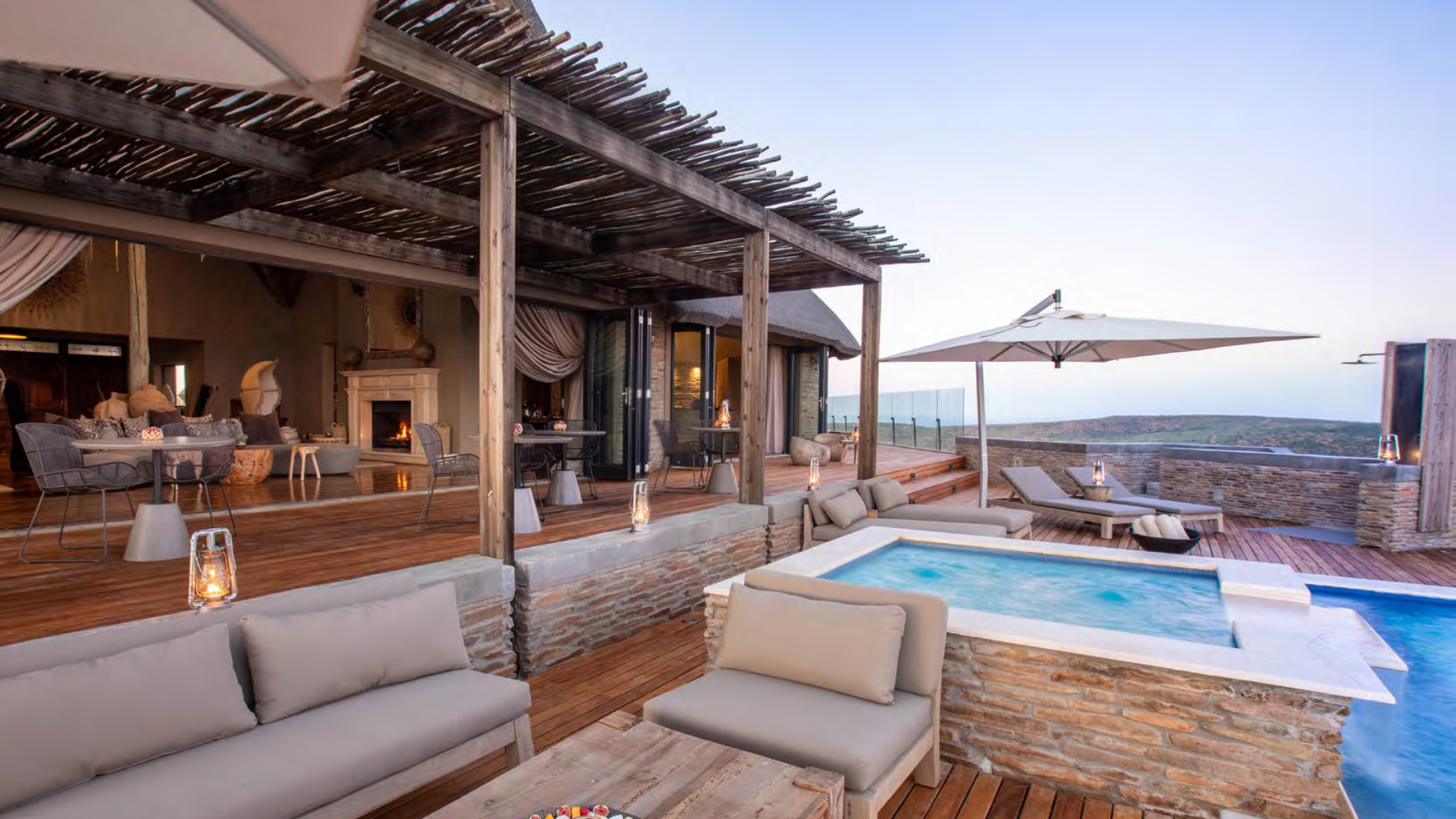 Luxurious villa interior with fireplace and panoramic views in Great Karoo, South Africa