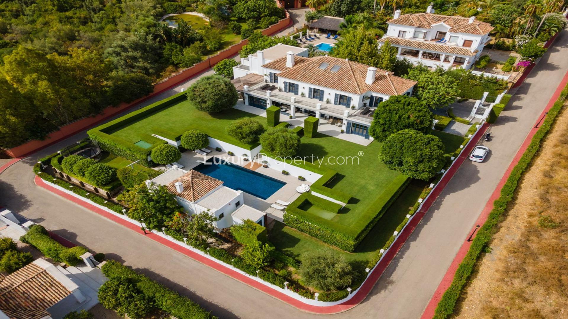 Luxury Marbella villa with private pool, modern patio, and elegant outdoor lighting in Málaga