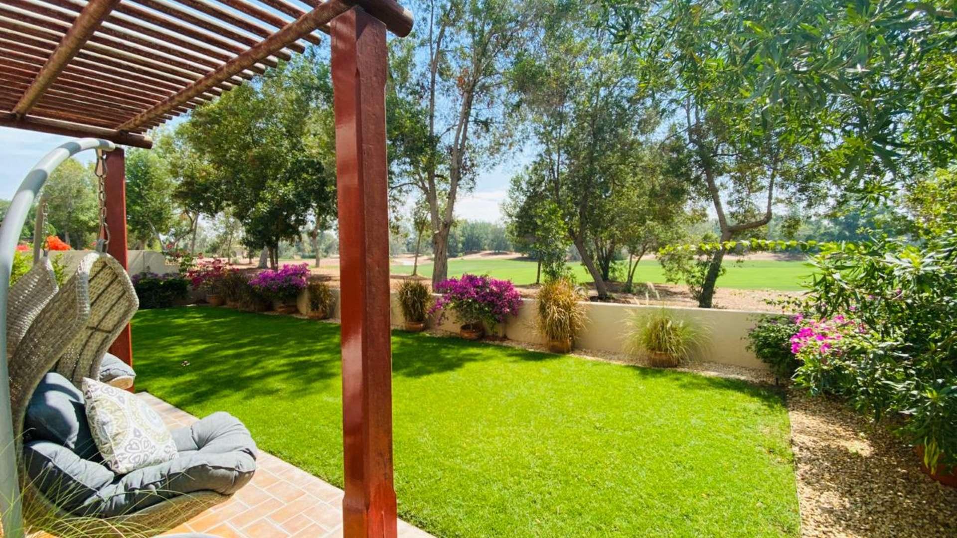 Family villa exterior with garden in Jumeirah Golf Estates, Earth community, for rent