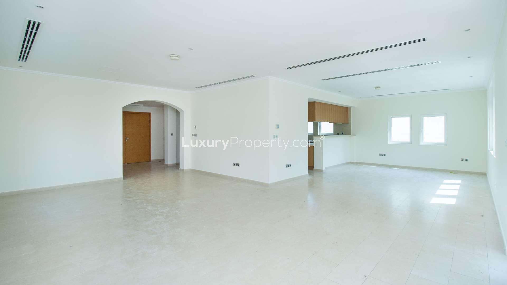 Entrance of 4 Bedroom Legacy Villa in Jumeirah Park, featuring garden and patio area