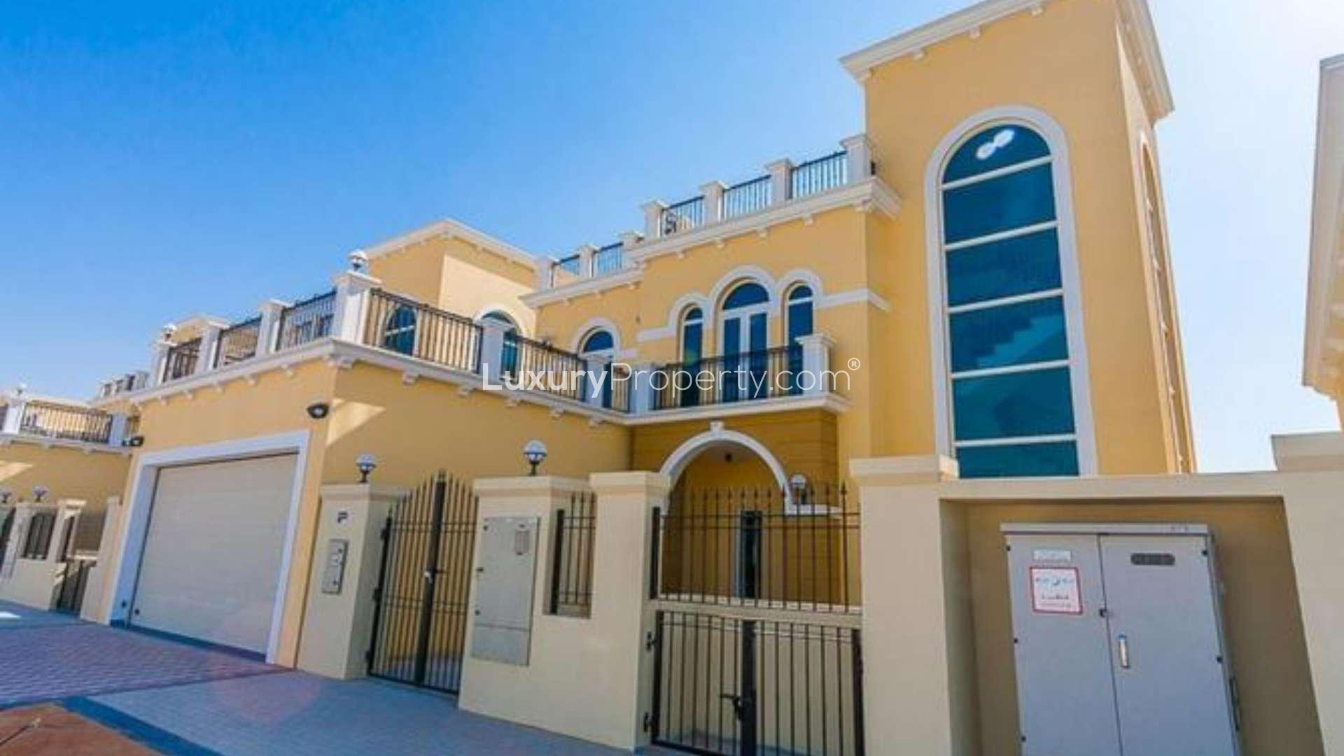 Exterior view of Four-Bed Legacy Nova Villa in Jumeirah Park, spacious backyard area