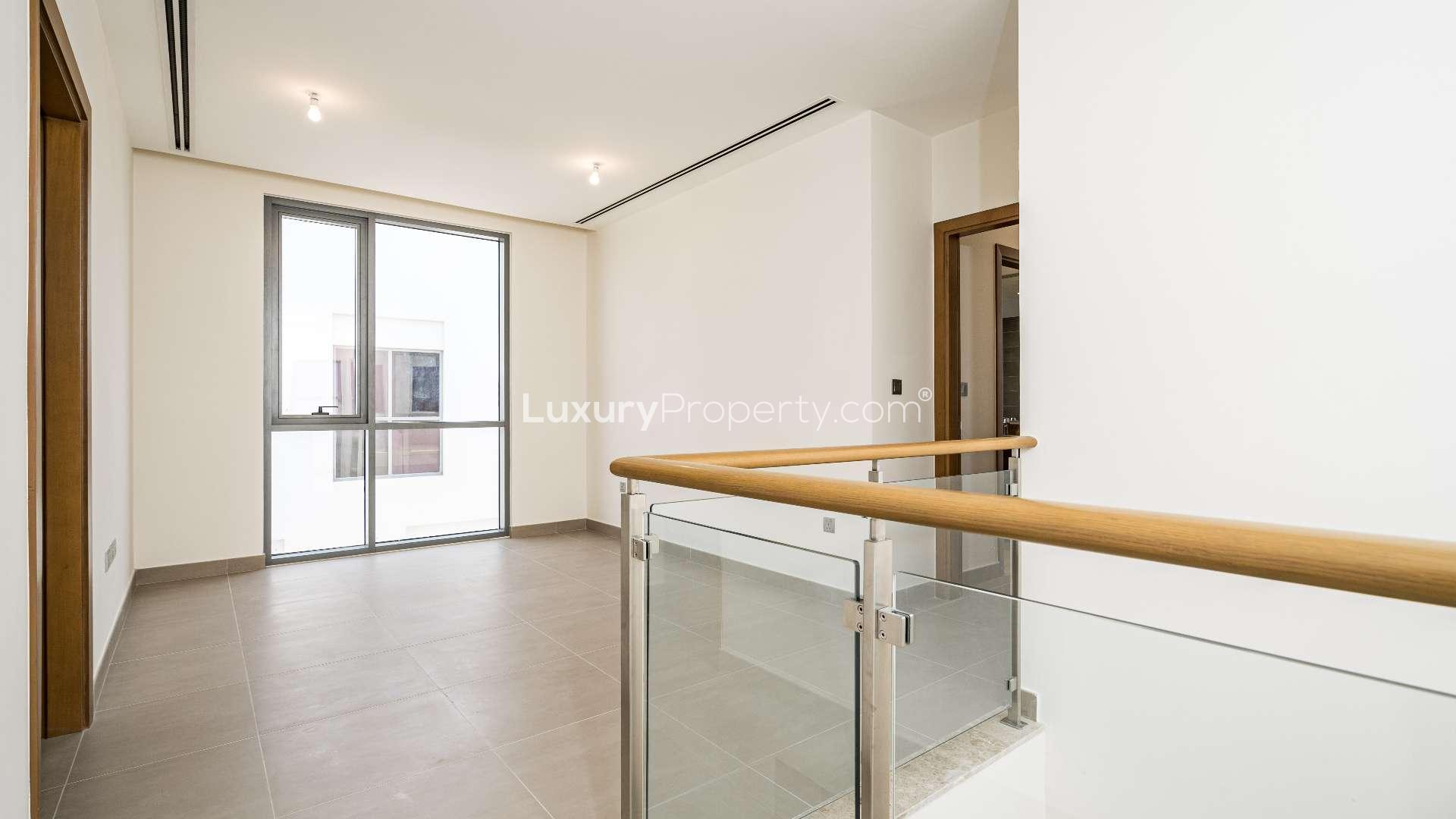 Modern kitchen and living area in Sidra Villas, Dubai Hills Estate, available for rent