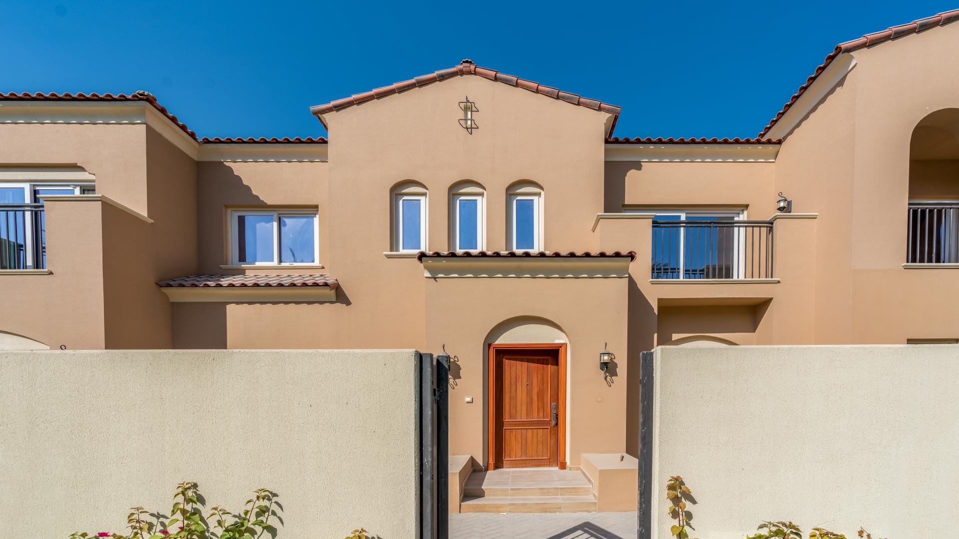 Exterior view of 4-bedroom villa with patio in Villanova, Dubai Land