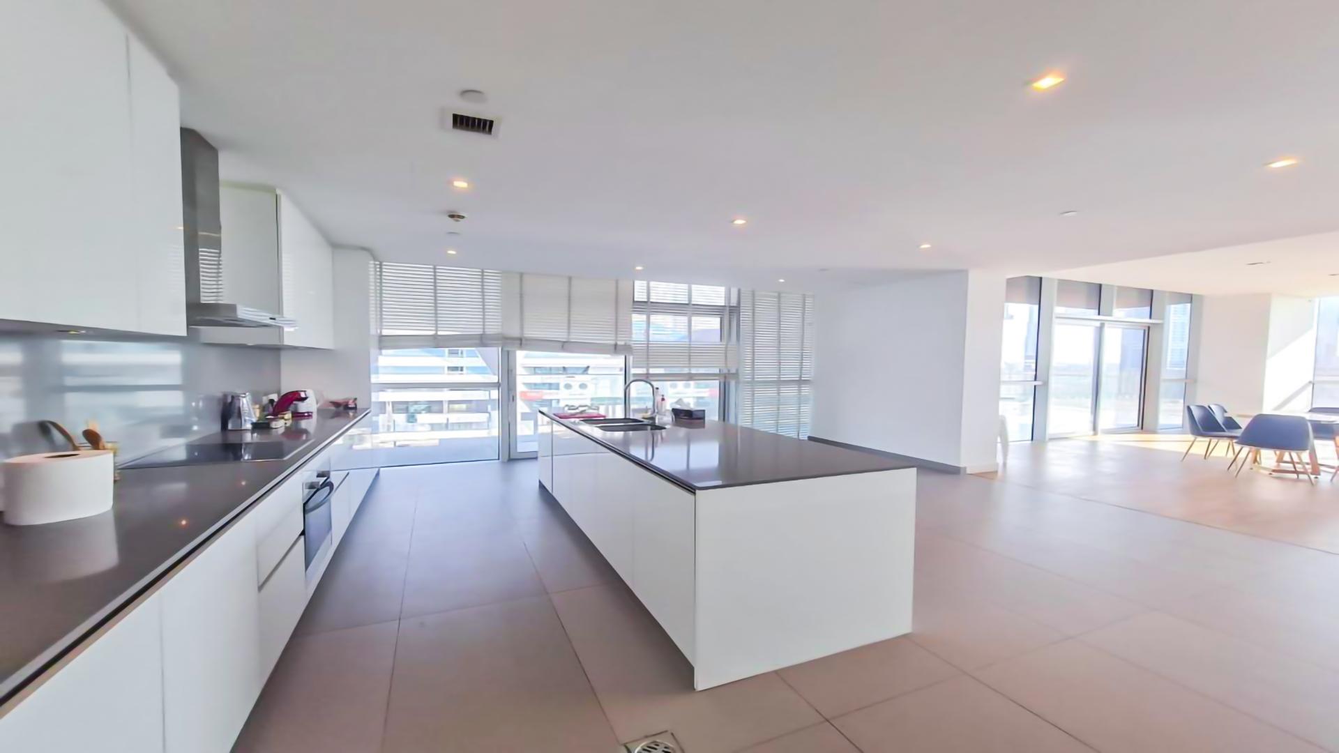 Luxurious living room with modern furniture and city views in City Walk, Dubai apartment