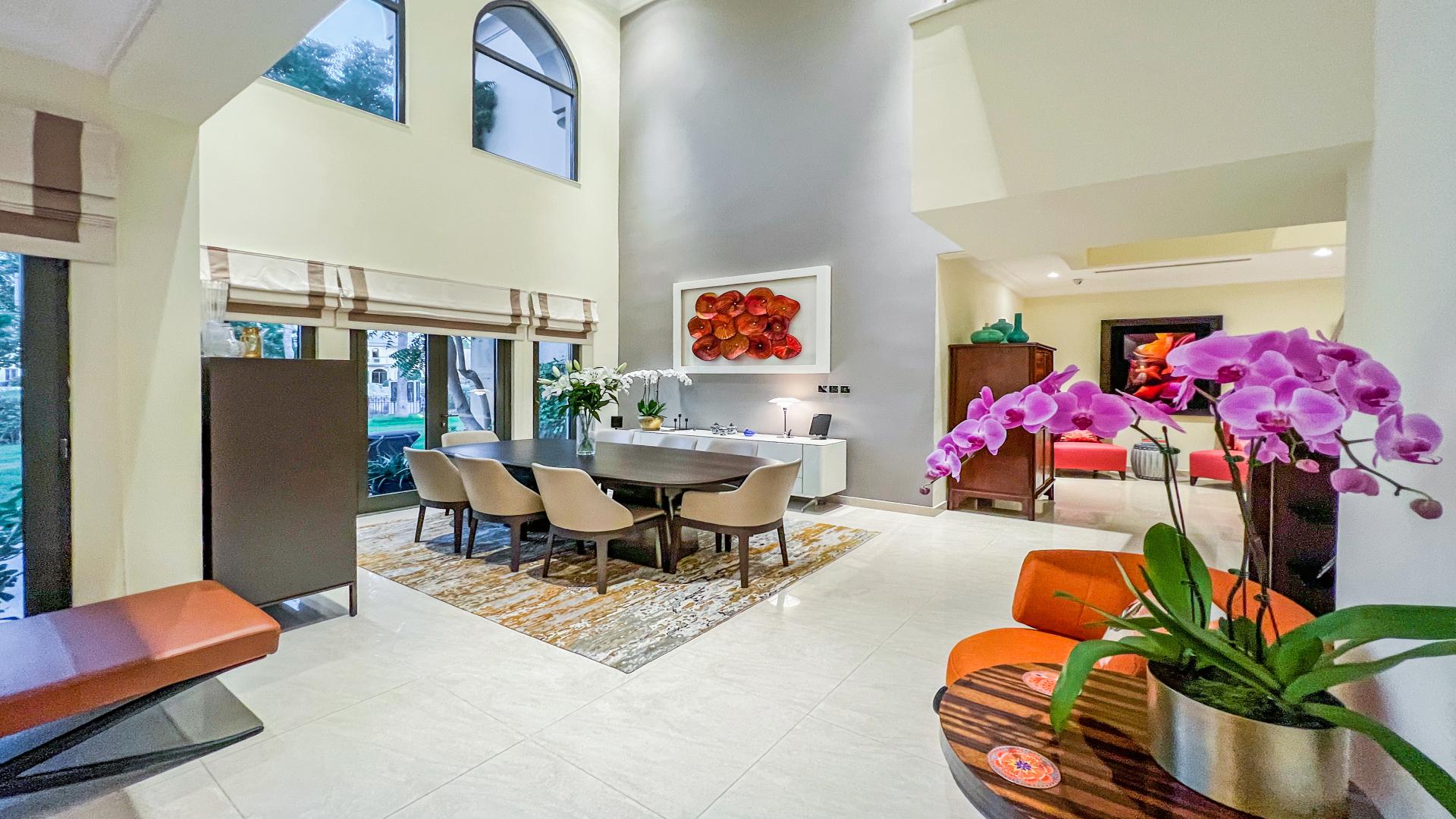 Exclusively listed upgraded 4-bedroom villa exterior with driveway, Palm Jumeirah, Canal Cove