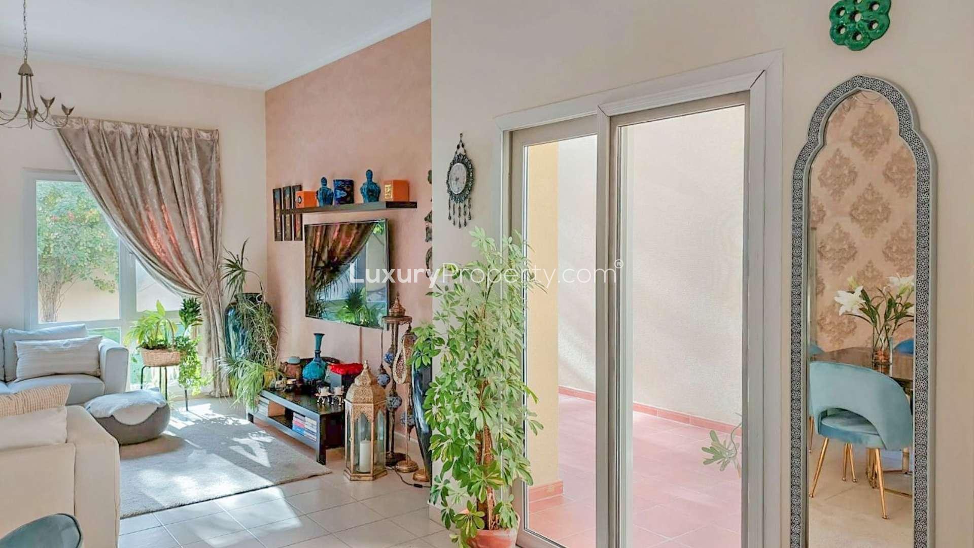 Exterior of Type 6 villa in Meadows 9 with patio and large windows