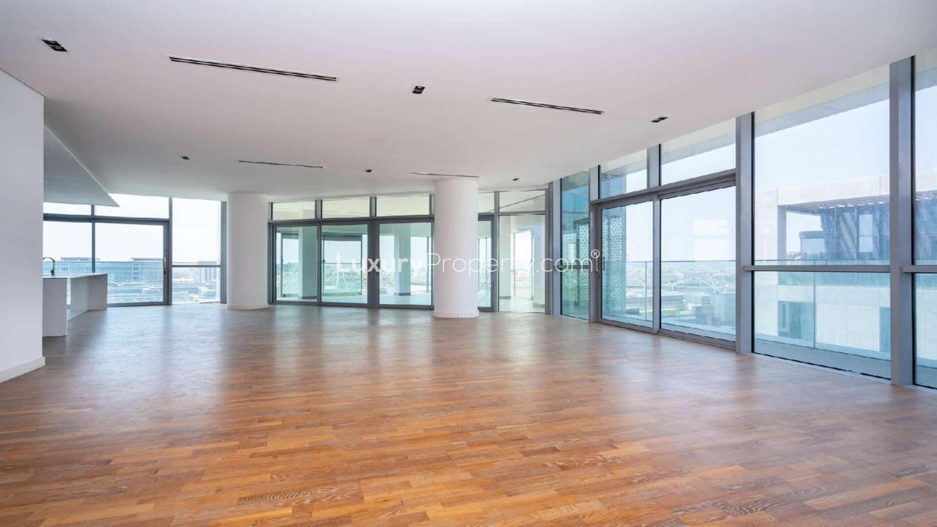 Spacious living area in four-bedroom City Walk apartment, Jumeirah, with floor-to-ceiling windows