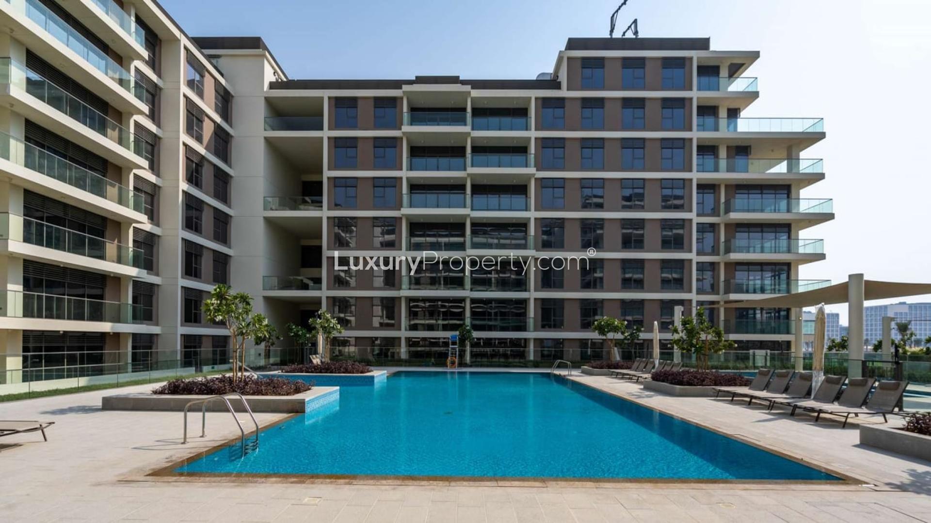 "View from Mulberry Duplex Apartment, Dubai Hills Estate, overlooking Park Heights and lush green spaces.","Modern exterior of duplex apartment in Mulberry, Dubai Hills Estate, Park Heights community.",Scenic view of Park Heights, Dubai Hills Estate with lush greenery and modern buildings