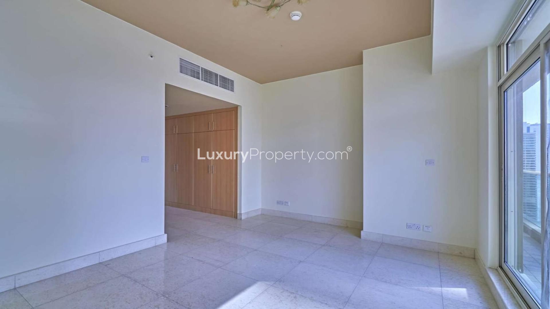 Spacious bedroom with built-in wardrobe in Marina Mansions apartment, Dubai Marina