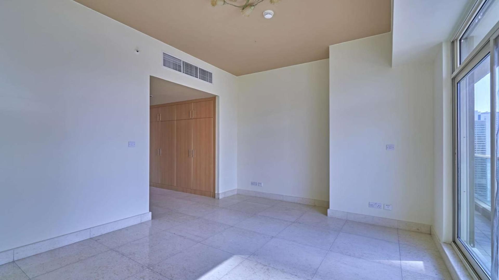 Spacious bedroom with built-in wardrobe in Marina Mansions apartment, Dubai Marina