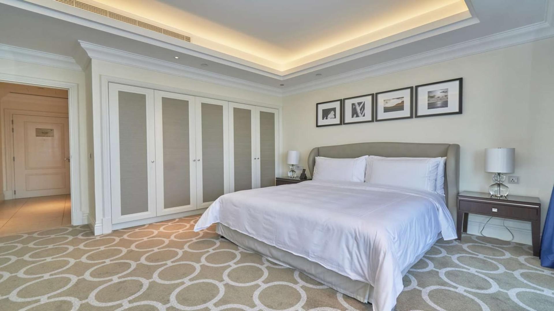 Luxurious dining area in spacious Downtown Dubai apartment with city skyline view