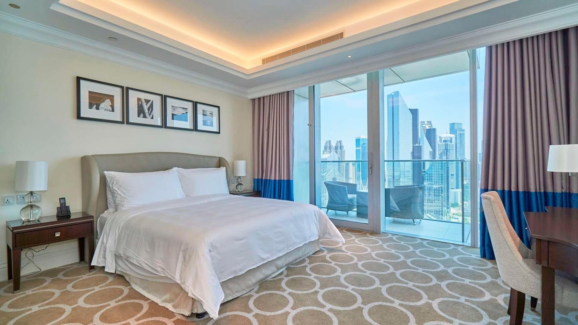 Luxurious living room in fully serviced Downtown Dubai apartment for rent, spacious open layout