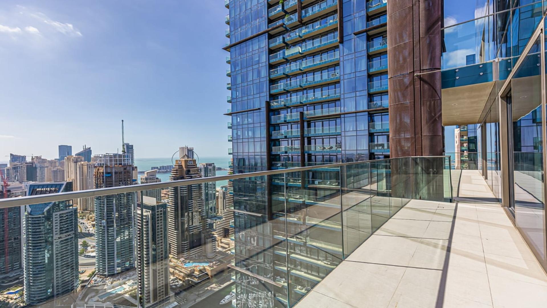 Modern interior of luxury duplex apartment in Marina Gate 1, Dubai Marina with city views