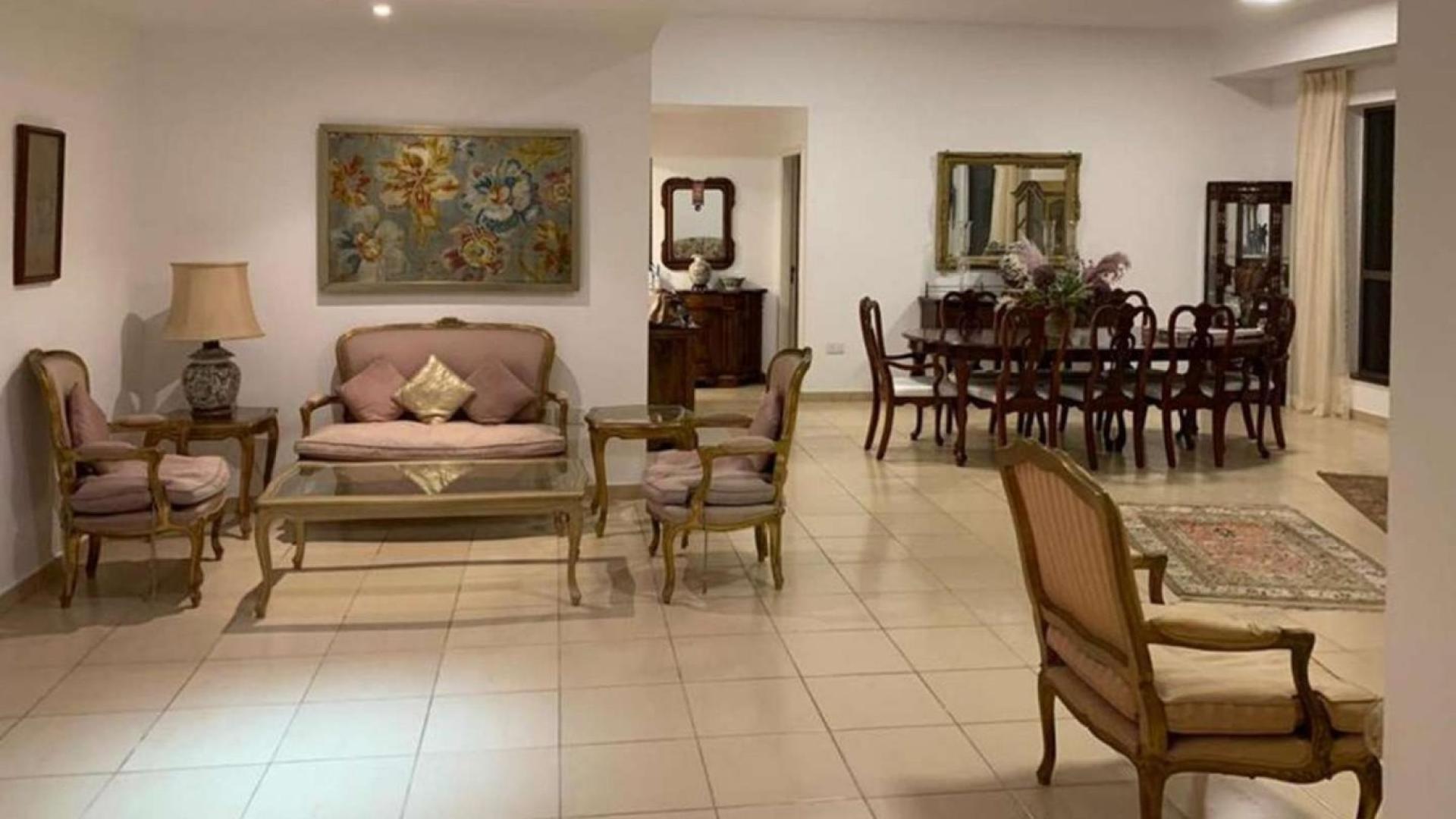 Elegant living room in Rimal 5 apartment, Jumeirah Beach Residence, with classic furniture and decor