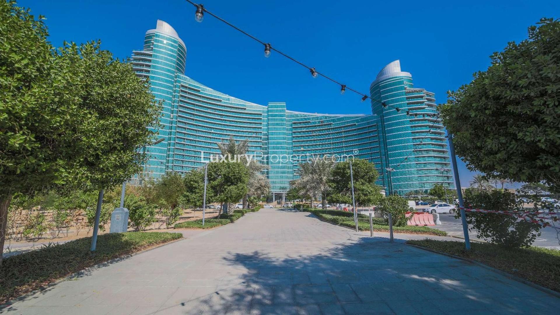 Bedroom with large windows and stunning view in Marsa Plaza, Dubai Festival City apartment