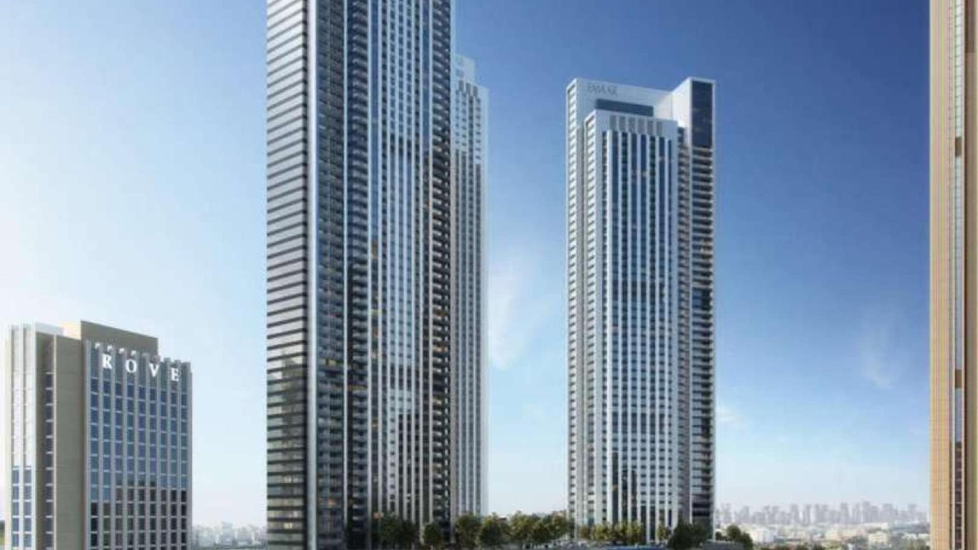 Luxurious Downtown Dubai apartment living room with stunning skyline views, modern decor, and balcony