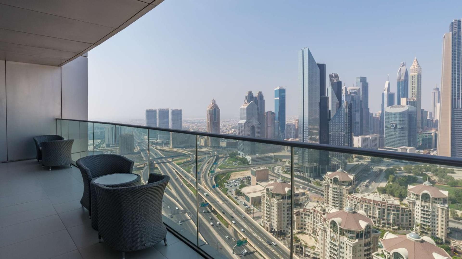 Luxurious dining area with DIFC views in Downtown Dubai apartment for sale