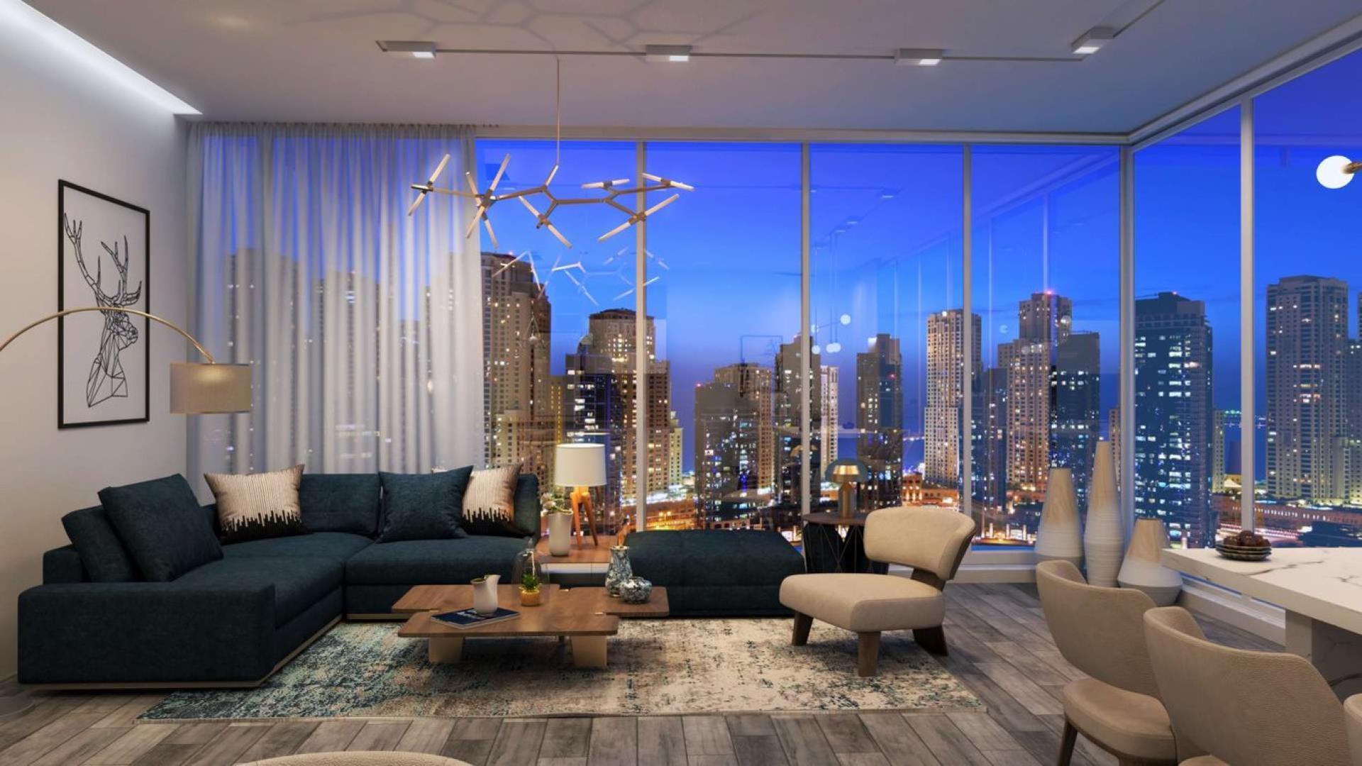 Luxury living room with city skyline view in Stella Maris, Dubai Marina apartment