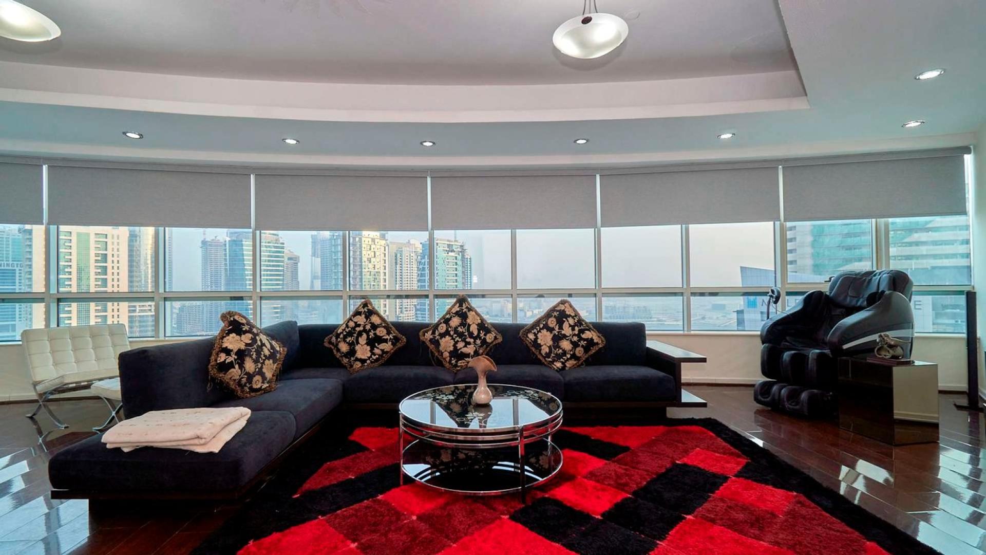 Luxurious living room in fully-furnished four-bed apartment, Dubai Marina Horizon Tower