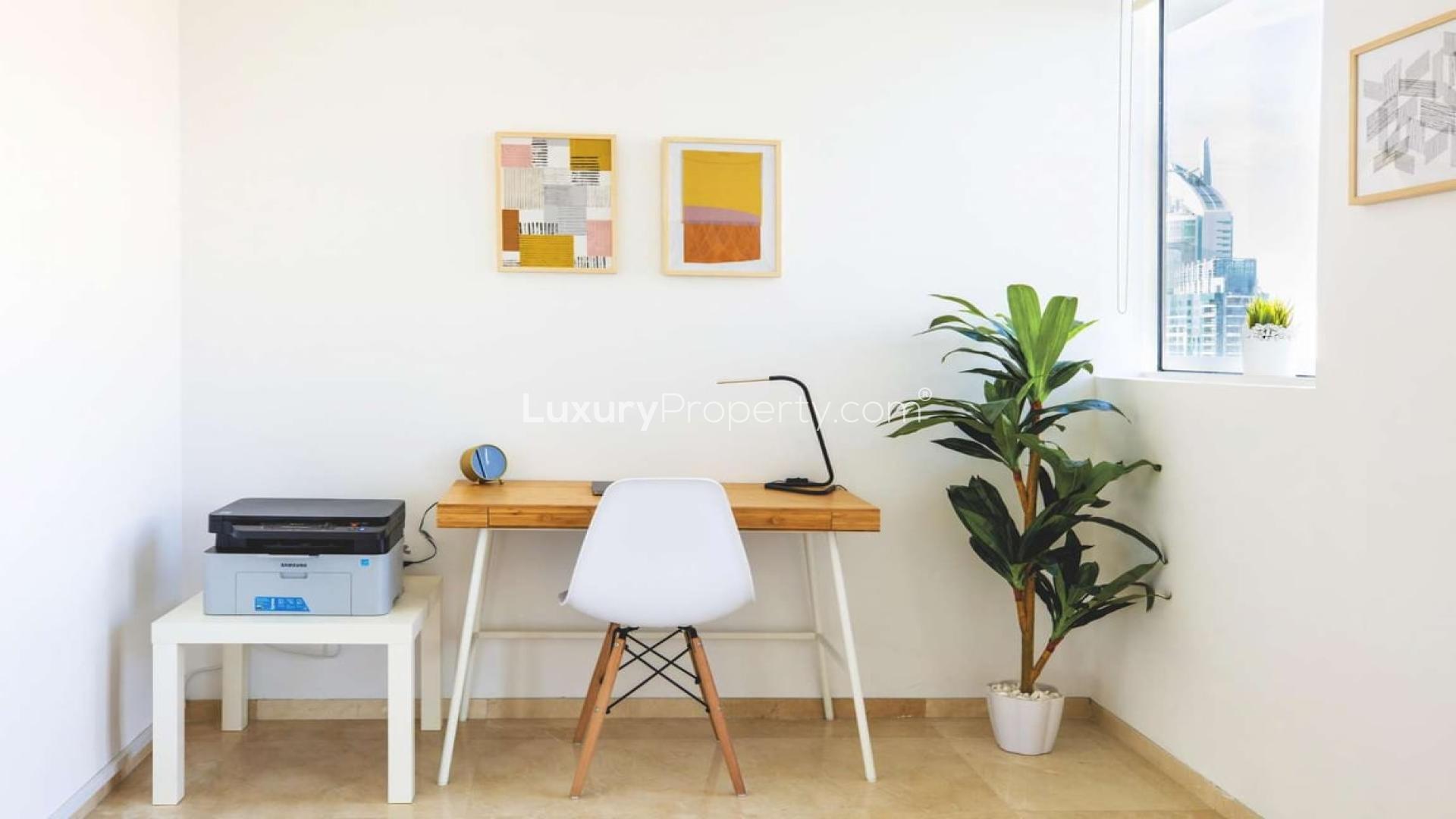 Modern home office in Dubai Marina penthouse with city view. Rent luxury living