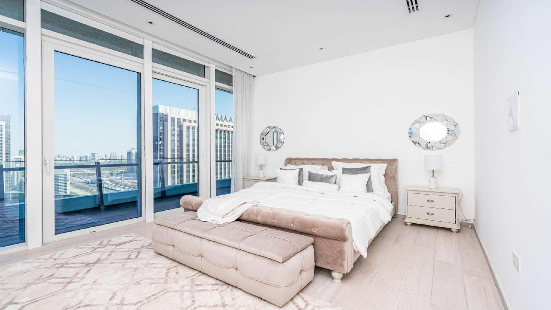 Luxurious living room in four-bedroom penthouse, Silverene Towers, Dubai Marina, modern decor