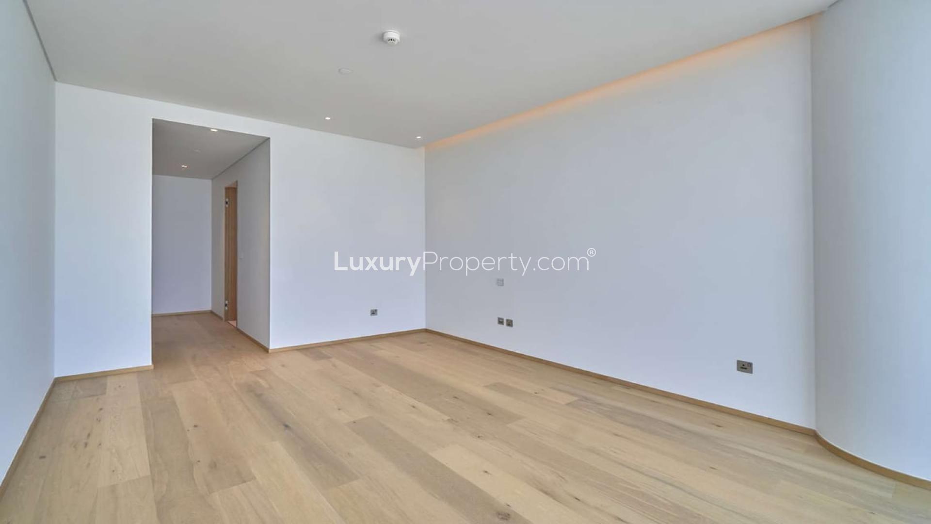 Spacious penthouse interior with floor-to-ceiling windows, stunning sea view at One Palm Jumeirah