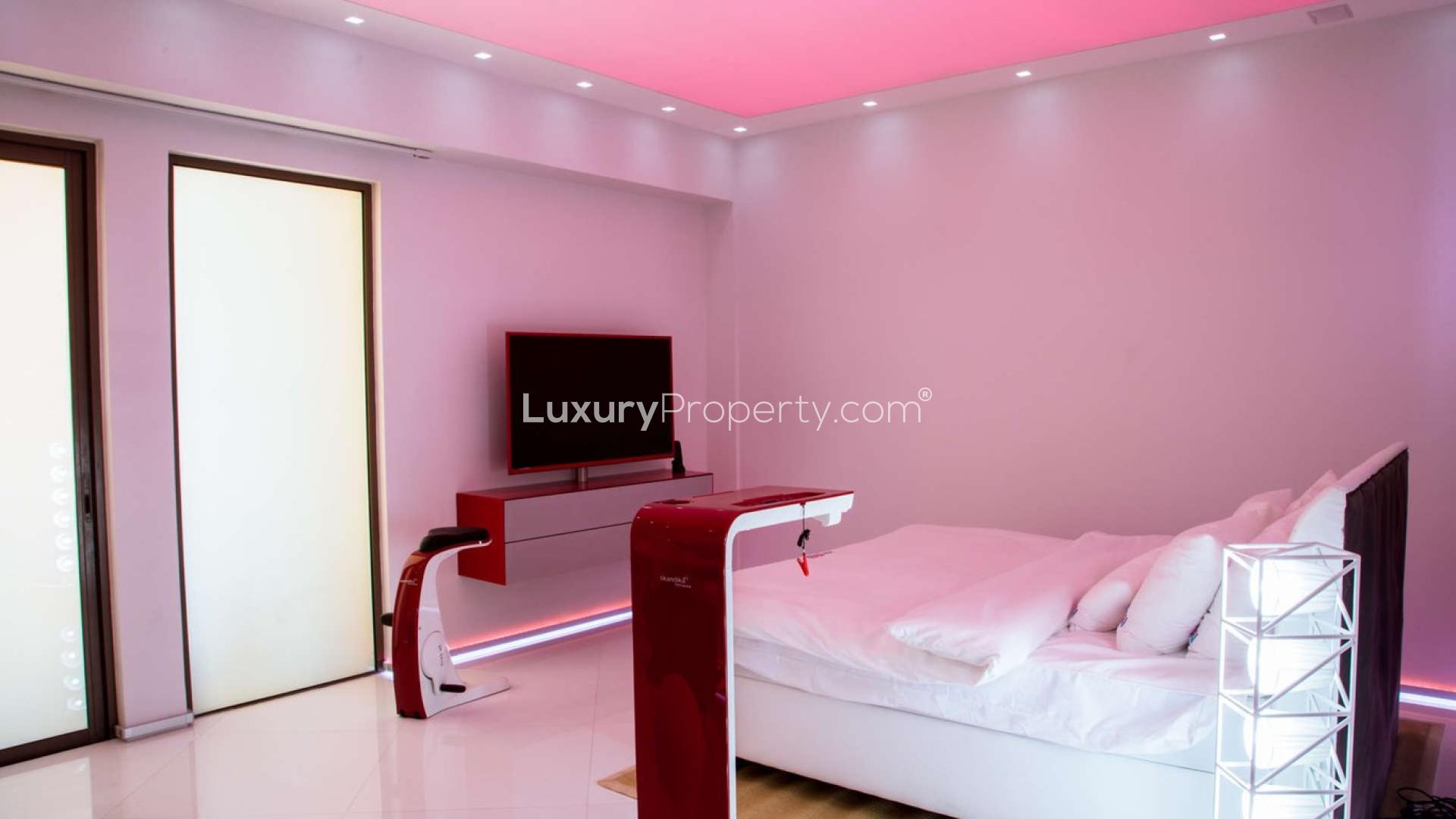 Modern bedroom with tech features in luxury Jumeirah Beach Residence penthouse, Rimal