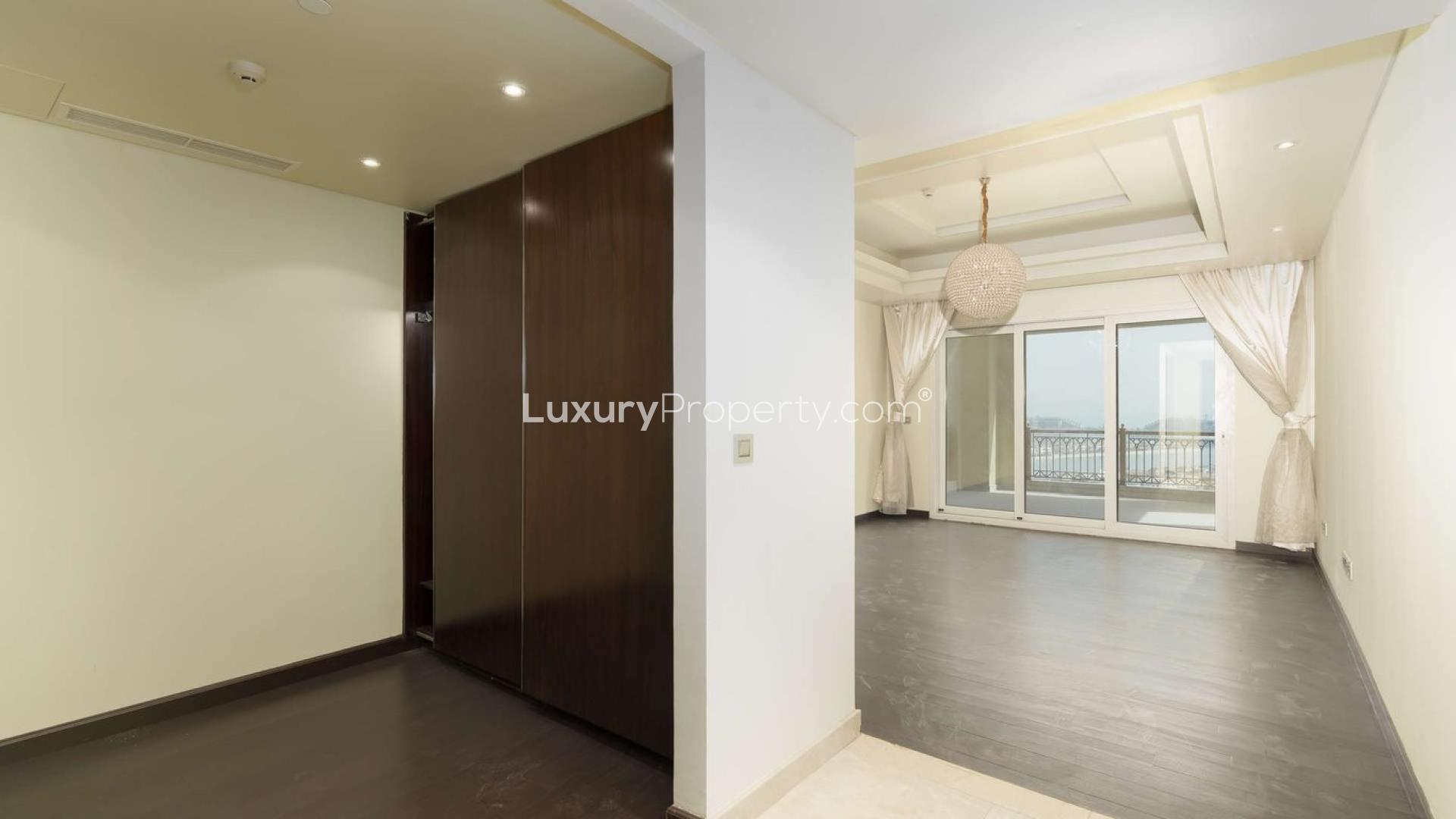 Furnished duplex penthouse interior with large windows in Marina Residences, Palm Jumeirah