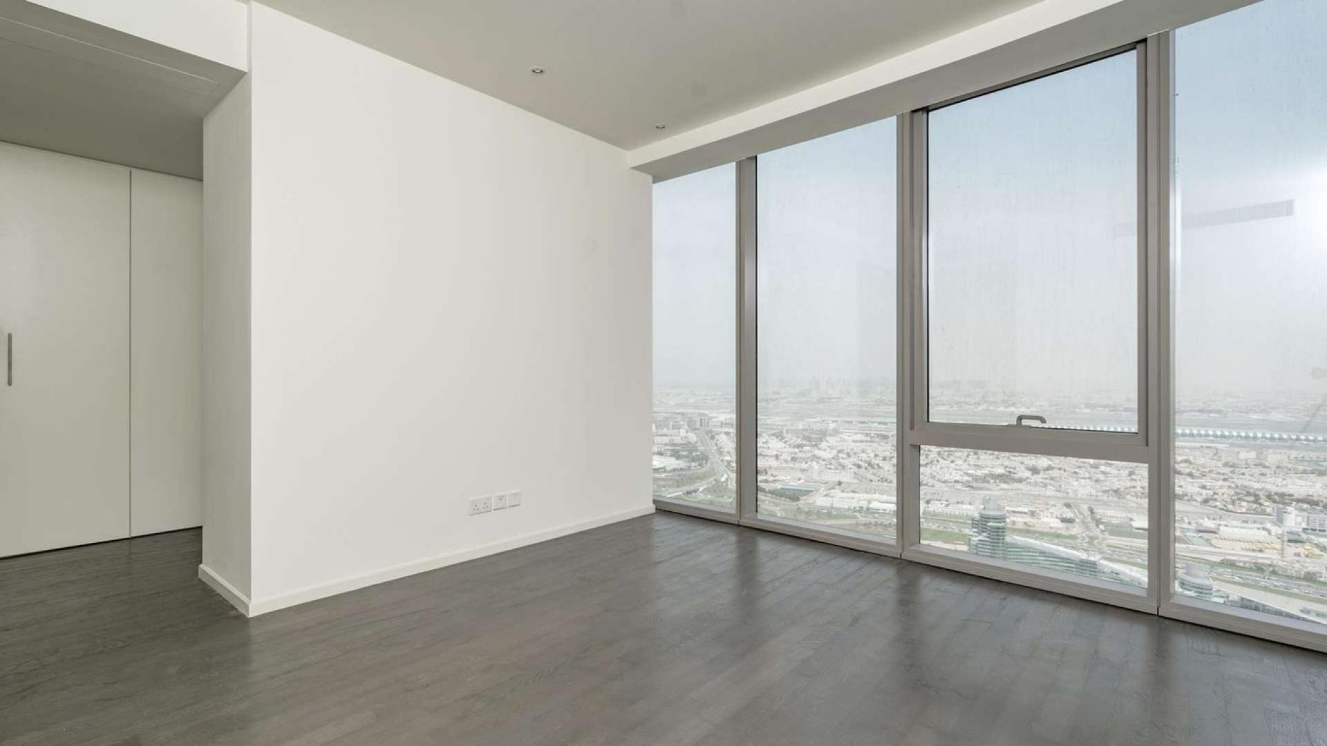 Modern kitchen and spacious living area in D1 Tower apartment, Culture Village