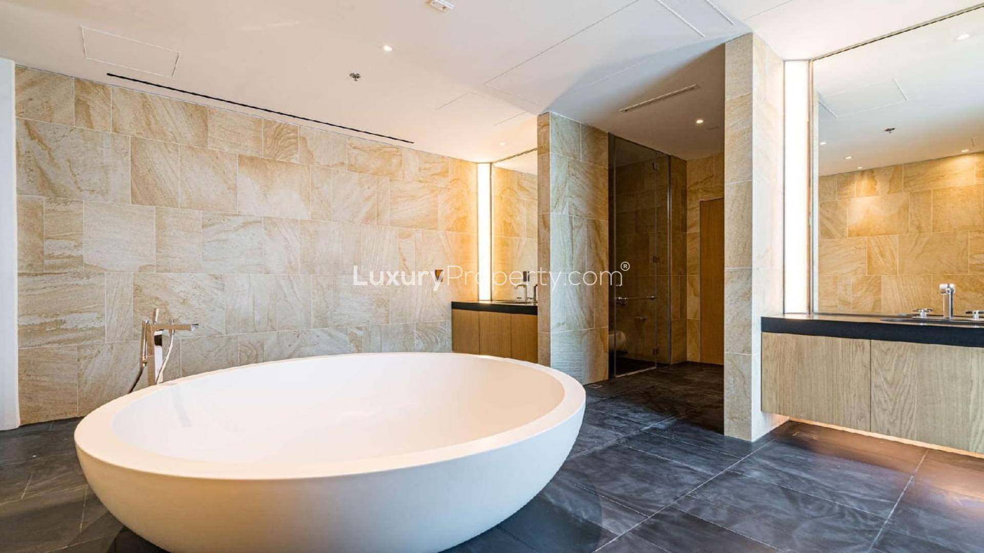 Luxurious penthouse balcony view at Bulgari Resort, Jumeirah Bay Island, overlooking Dubai skyline