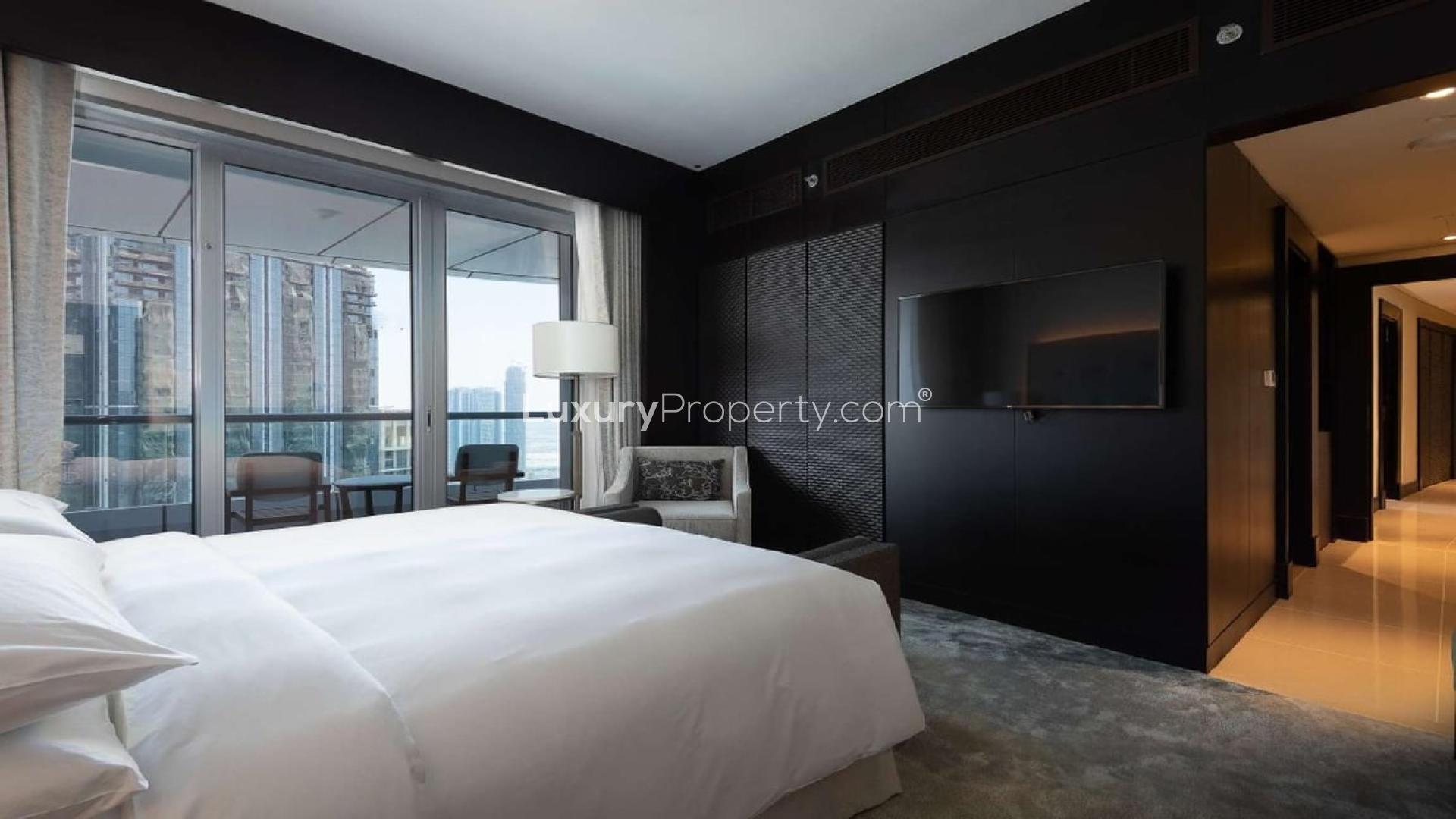Luxurious living room in 4-bedroom penthouse, The Address Downtown, Dubai with modern furnishings