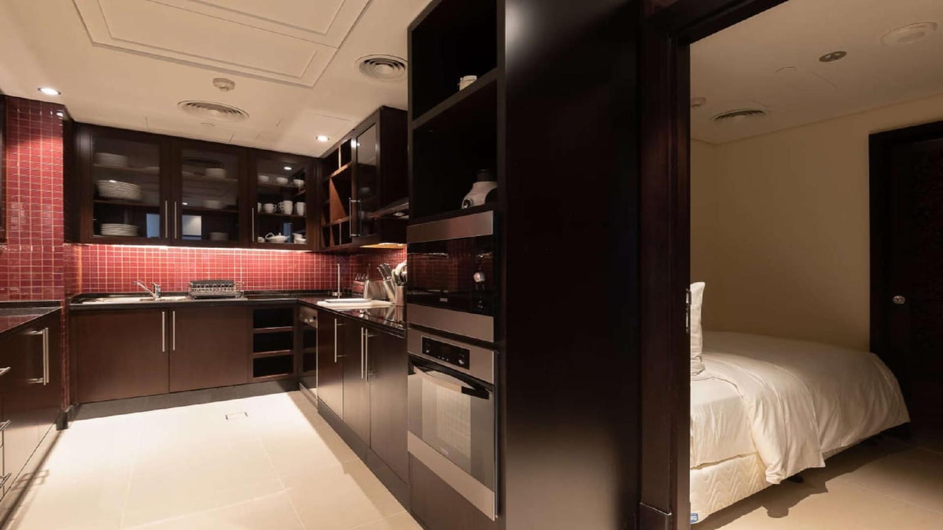 Luxurious living and dining area in 4-bedroom penthouse, The Address Downtown, Dubai