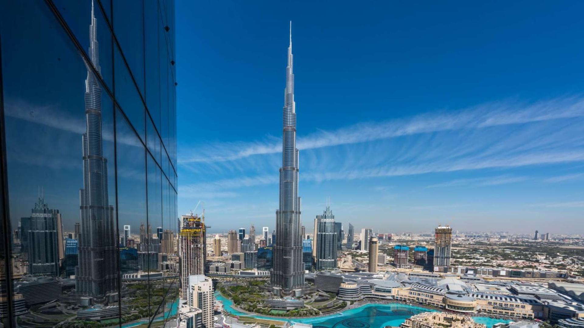 Alt text: "View from Vida Residences Penthouse overlooking Downtown Dubai skyline and Burj Khalifa.",Penthouse view of Burj Khalifa from Vida Residences, Downtown Dubai. Luxurious skyline vista