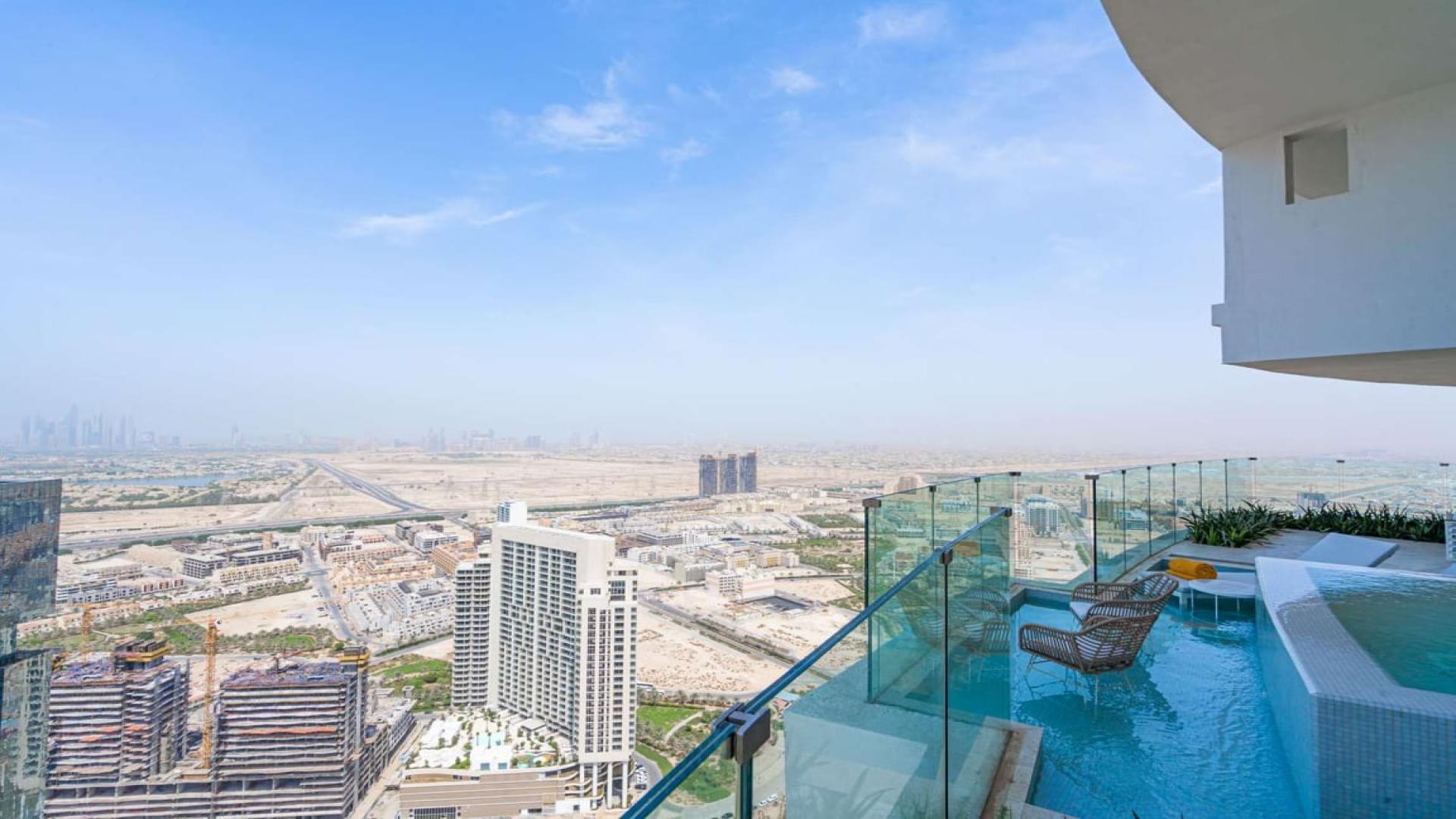 Luxurious penthouse living room, modern decor, at The Five JVC, Jumeirah Village Circle