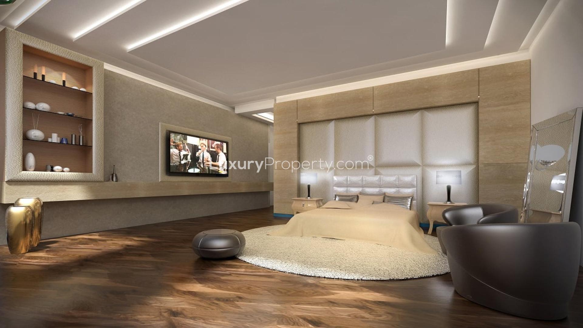 Luxurious Palm Jumeirah penthouse bedroom with sea view, modern decor, and ample natural light