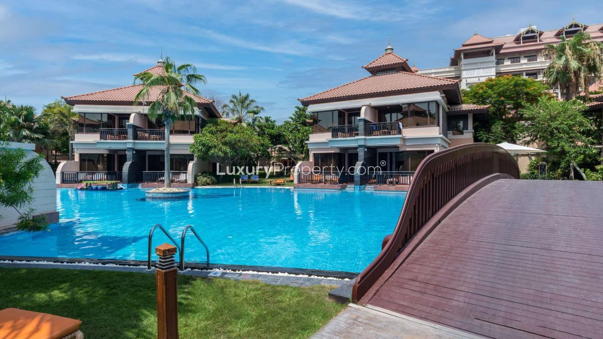 Aerial view of Anantara Residences with pool, overlooking Arabian Gulf, Palm Jumeirah