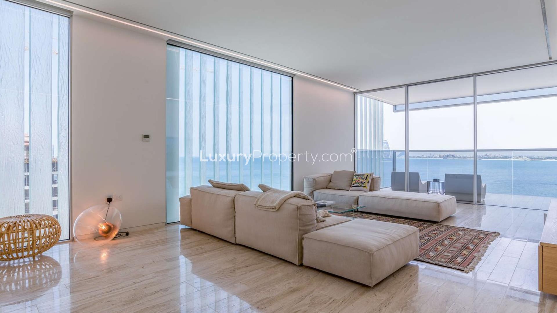 "Luxurious living room with ocean view in Muraba Residences penthouse, Palm Jumeirah.",Luxurious living room in Muraba Residences penthouse, Palm Jumeirah, with stunning sea views