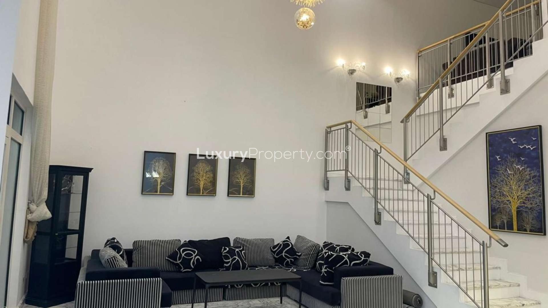 Modern living room in fully renovated duplex penthouse, Shoreline Apartments, Palm Jumeirah