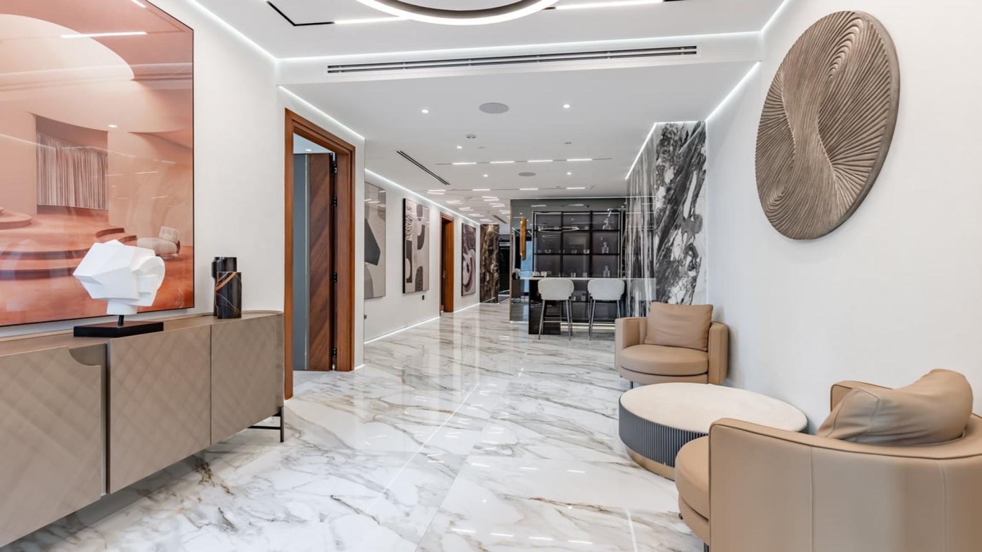 Luxurious living room in LIV Residence penthouse, Dubai Marina, with modern decor and city views