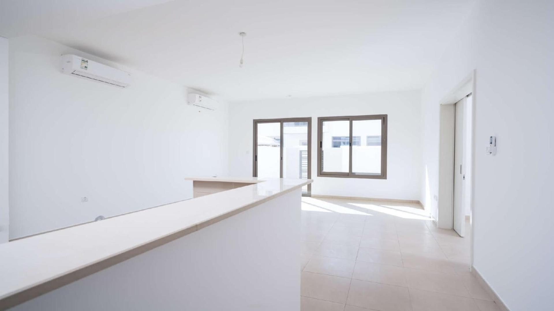 Modern 4-bedroom townhouse exterior in Zahra, Town Square, available for rent