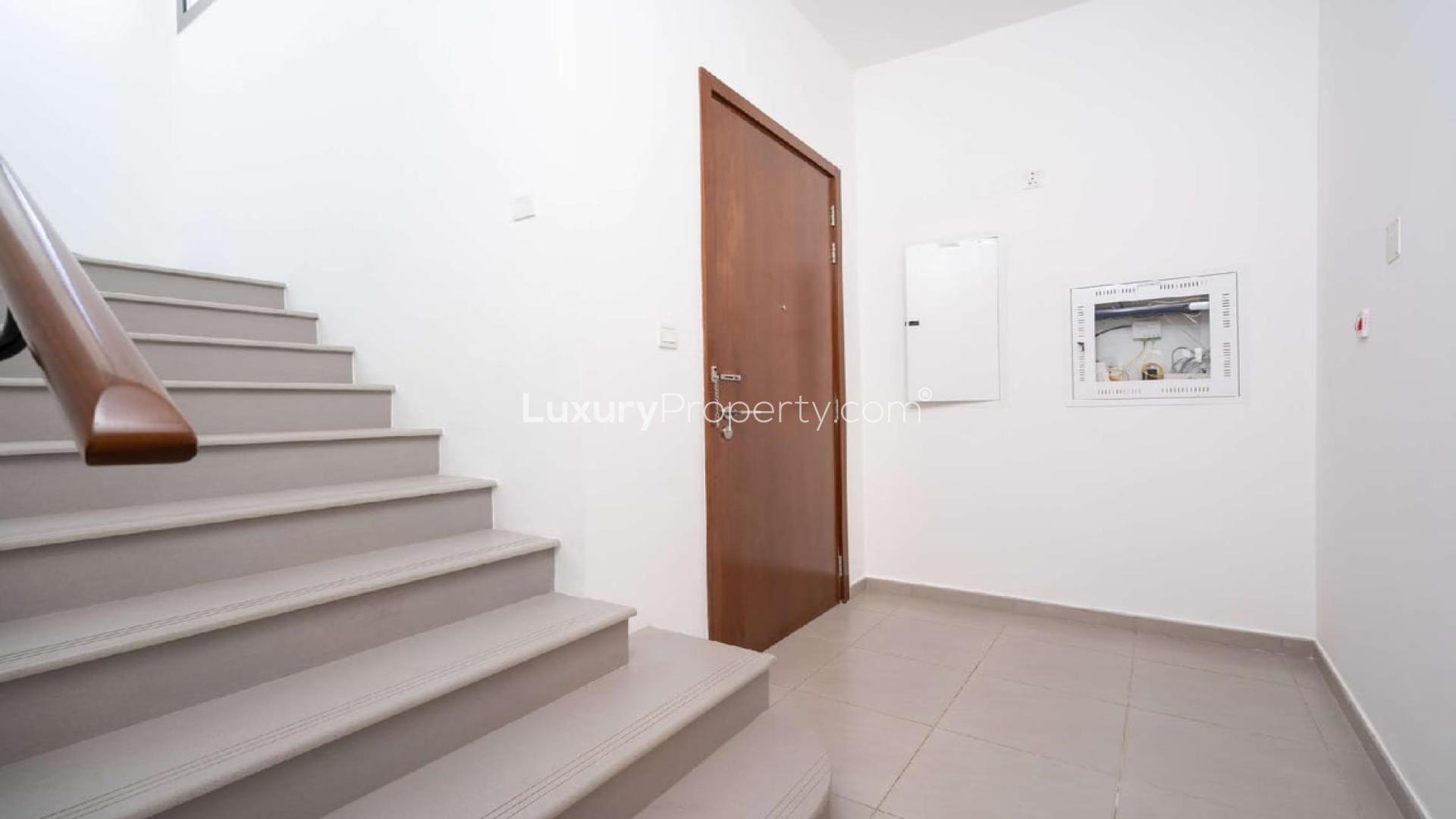 Modern 4-bedroom townhouse exterior in Zahra, Town Square, available for rent