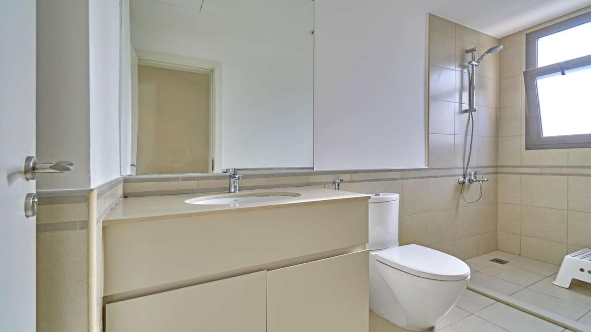 Outdoor patio with trampoline and dining area in Hayat, Town Square townhouse for rent